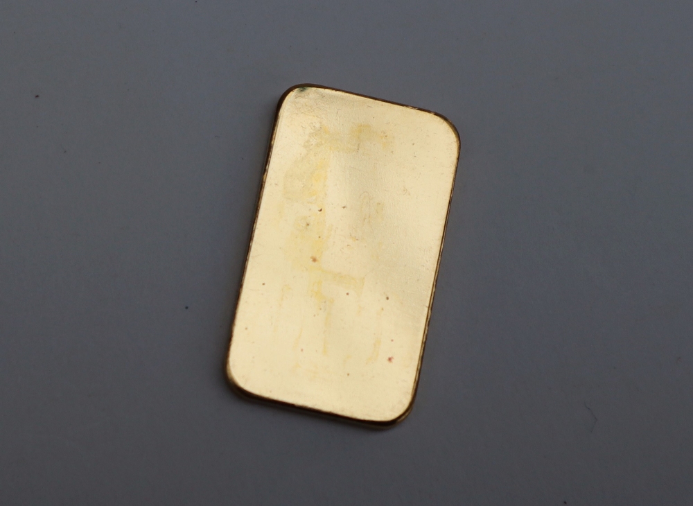 A 20g fine gold bar, stamped to one side 'Credit Suisse 20g Feingold 999. - Image 2 of 2