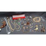 Assorted costume jewellery including a Christian Dior necklace, other necklaces, brooches, rings,