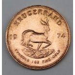 South Africa - A 1974 Krugerrand, 1 oz. fine gold (.999). Obv: Bust of Paul Kruger left.