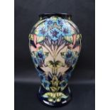 A Moorcroft pottery Profusion pattern limited edition vase, by Philip Gibson, no.