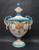 A Royal Worcester twin handled Adams Style vase and cover,