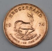 South Africa - A 1974 Krugerrand, 1 oz. fine gold (.999). Obv: Bust of Paul Kruger left.