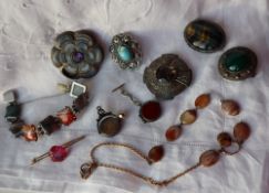 An agate set bracelet together with hard stone and semi precious stone set brooches,