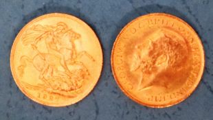 Two George V gold sovereigns,