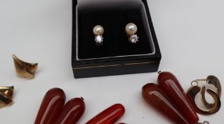 A pair of pearl and paste set earrings,