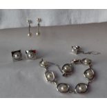 A silver bracelet set with pearls, together with a pair of silver and pearl set cufflinks,