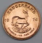 South Africa - A 1974 Krugerrand, 1 oz. fine gold (.999). Obv: Bust of Paul Kruger left.