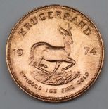 South Africa - A 1974 Krugerrand, 1 oz. fine gold (.999). Obv: Bust of Paul Kruger left.