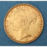 A Victorian gold sovereign dated 1885