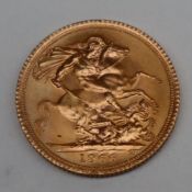 An Elizabeth II gold sovereign dated 1966 CONDITION REPORT: 1966 Sovereign photos in