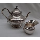 A French white metal teapot,