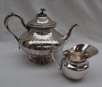 A French white metal teapot,