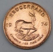 South Africa - A 1974 Krugerrand, 1 oz. fine gold (.999). Obv: Bust of Paul Kruger left.