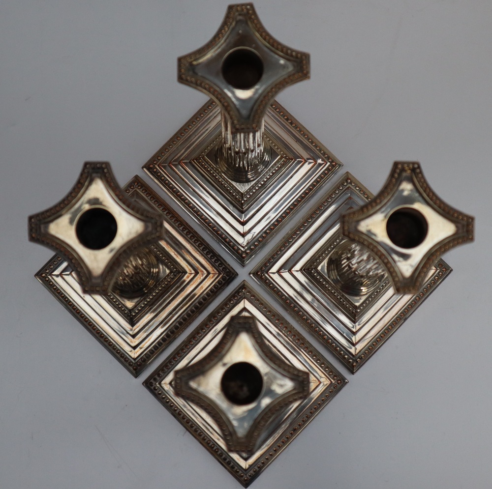 A set of four electroplated on copper Corinthian column candlesticks with stop fluted columns on a - Image 4 of 4