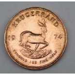 South Africa - A 1974 Krugerrand, 1 oz. fine gold (.999). Obv: Bust of Paul Kruger left.