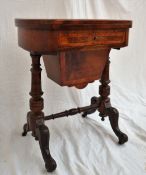 A Victorian games / work table, the oval top enclosing a playing surface for chess,