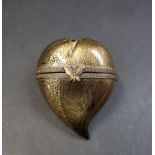 A gilt decorated black glass heart shaped box and cover,