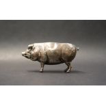 A novelty silver pin cushion in the form of a standing pig, marks indistinct,