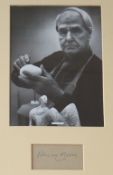 Henry Moore A black and white photograph Mounted with a signed card Signed in pencil Photograph