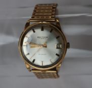 A Gentleman's 9ct yellow gold Waltham wristwatch, the silvered dial with batons and a date aperture,