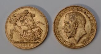 Two George V gold sovereigns,