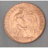 A gold 20 Francs Rooster coin,