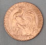 A gold 20 Francs Rooster coin,