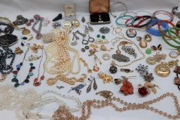 Assorted costume jewellery including bangles, necklaces,