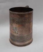 A Victorian silver tankard with line decoration, engraved with a crowned lion, London, 1872,