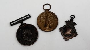 Two World War I medals including the Victory Medal and The British War Medal,