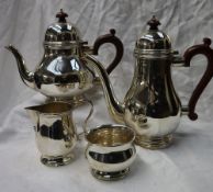 An Elizabeth II silver four piece teaset, comprising a hot water pot, teapot,