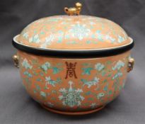 A Chinese porcelain tureen, cover and liner,