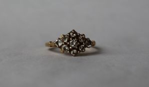 An 18ct yellow gold diamond cluster ring,