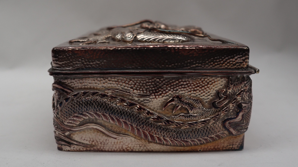 A Chinese silver cigarette case, the top decorated with a dragon and initialled, marked 90, - Image 9 of 15