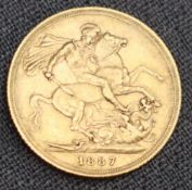 A Victorian gold sovereign dated 1887