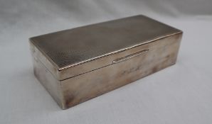 An Elizabeth II silver cigarette case,