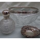 A George V silver topped scent bottle, with a domed top and a hobnail cut glass bulbous body,