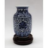 A Chinese blue and white porcelain vase, decorated with flowers and leaves,