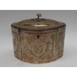 A George III white metal tea caddy, of shaped oval form, the domed hinged lid with a floral finial,