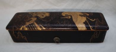 A Japanese hiramaki-e lacquer box and cover decorated with a crane in flight,