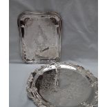 A white metal dish of rectangular form, with a beaded border,