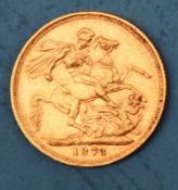 A Victorian gold sovereign dated 1873