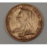 A Victorian gold sovereign dated 1897,