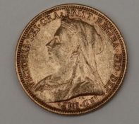 A Victorian gold sovereign dated 1897,