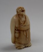 A late 19th / early 20th century ivory netsuke,