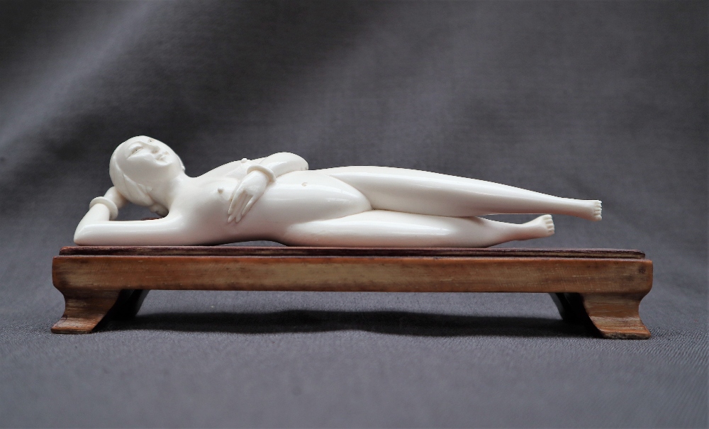 An early 20th century Japanese ivory erotica figure of a recumbent naked figure, 15. - Image 2 of 7