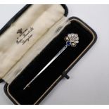 A 15ct yellow gold and platinum bar brooch of fan shape set with old cut diamonds,