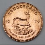 South Africa - A 1974 Krugerrand, 1 oz. fine gold (.999). Obv: Bust of Paul Kruger left.