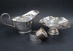 A George V silver sauce boat, of usual form ion an oval base,