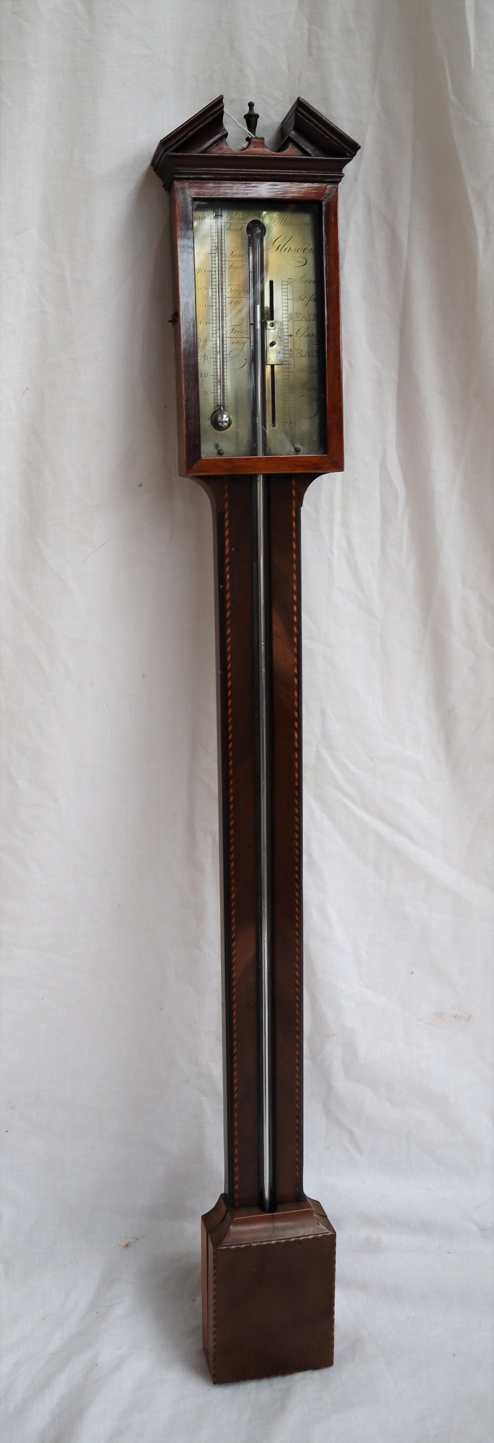 A 19th century mahogany stick barometer,